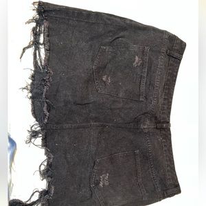 Black denim ripped mini skirt